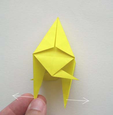 origami-fish-pulling bottom corners of kite apart, to form fins of angel fish